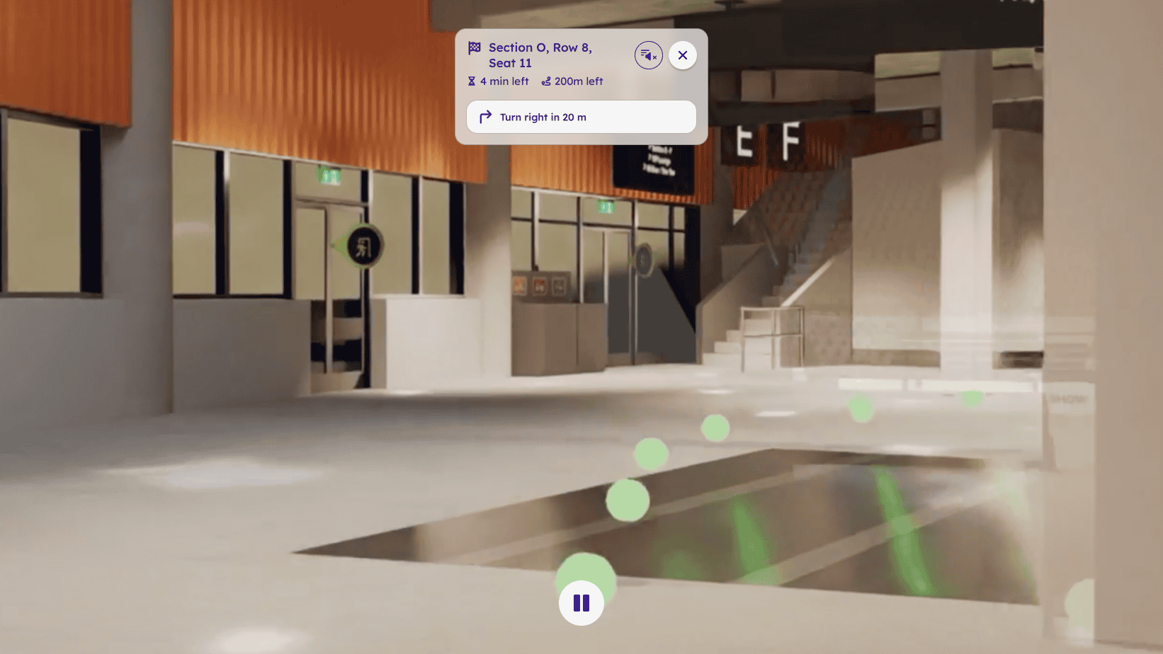 A wayfinding view in the AccessCity app showing a route to a destination inside the arena